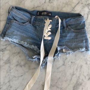 Adorable laced up denim shorts